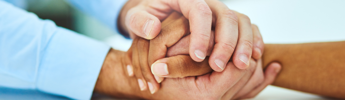loved ones grasping hands